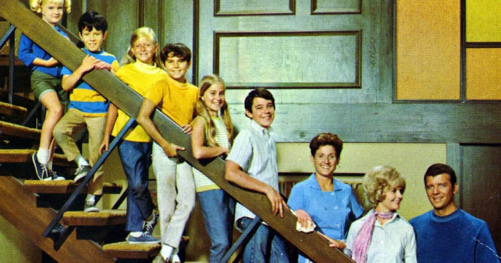 The Brady children on the staircase on the set of Brady Bunch television show.